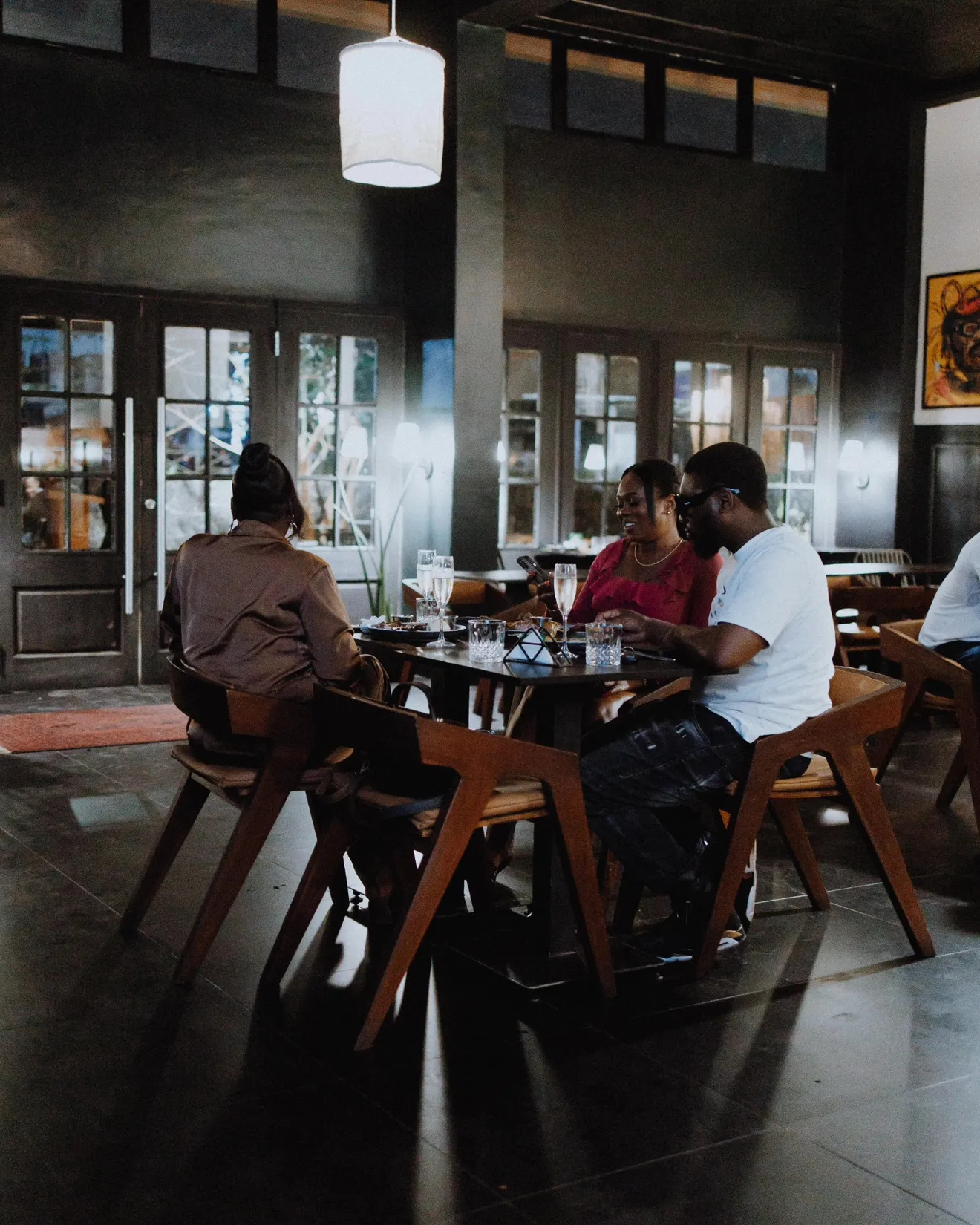 Early tables by the glazed doors